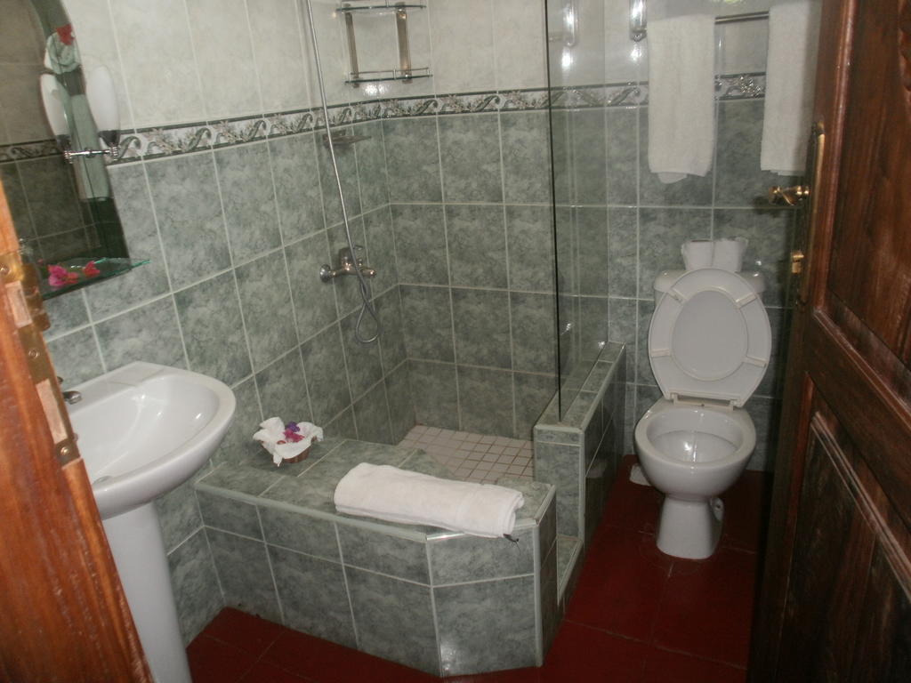 Asmini Palace Hotel Zanzibar Rum bild